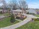 Beautiful two-story brick home with manicured lawn and long driveway at 3901 S Meridian St, Indianapolis, IN 46217