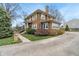 Beautiful two-story brick home with manicured lawn and mature landscaping at 3901 S Meridian St, Indianapolis, IN 46217