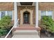 Charming front entrance with classic architectural details and lush greenery at 3901 S Meridian St, Indianapolis, IN 46217