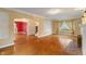 Bright living room with hardwood floors and a fireplace at 3901 S Meridian St, Indianapolis, IN 46217