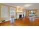 Bright living room with hardwood floors and a fireplace at 3901 S Meridian St, Indianapolis, IN 46217