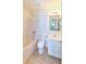 Neat bathroom with a tub shower combination, white vanity, and updated fixtures at 4043 Oak Trail Dr, Indianapolis, IN 46237