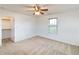 Comfortable bedroom with a window for natural light and an open closet at 4043 Oak Trail Dr, Indianapolis, IN 46237