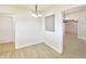Bright dining area with wood-look floors and open views to other living spaces at 4043 Oak Trail Dr, Indianapolis, IN 46237