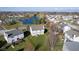 Aerial shot of a home with a spacious backyard, part of a community near a serene lake at 4801 Copper Grove Dr, Indianapolis, IN 46237