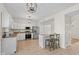 Well-lit kitchen featuring stainless steel appliances, tile flooring, and a breakfast bar at 4801 Copper Grove Dr, Indianapolis, IN 46237