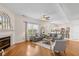 Inviting living room features hardwood floors, a fireplace, and an open layout with seamless kitchen access at 4801 Copper Grove Dr, Indianapolis, IN 46237