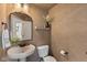Stylish powder room with a pedestal sink, ornate mirror, and modern fixtures at 5387 Citadel Dr, Noblesville, IN 46062
