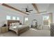 Bright primary bedroom featuring wood beams, plenty of light, and comfortable decor at 5387 Citadel Dr, Noblesville, IN 46062