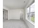Bright bedroom featuring large windows, neutral tones, and comfortable carpeting at 5869 Jamestown Square Ln, Indianapolis, IN 46234