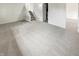 Large carpeted basement featuring access to the laundry area, with lots of room for customizable living or recreational space at 5927 Timber Lake Blvd, Indianapolis, IN 46237