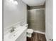 Clean bathroom featuring an updated vanity, tiled shower, and modern fixtures at 5927 Timber Lake Blvd, Indianapolis, IN 46237