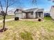 Charming single-Gathering home showcasing stone accents, an attached garage, and a well-maintained front yard at 5927 Timber Lake Blvd, Indianapolis, IN 46237