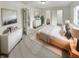 Serene main bedroom featuring neutral decor, ample natural light, and multiple entry points at 5927 Timber Lake Blvd, Indianapolis, IN 46237