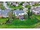 Aerial shot of a home with a large backyard, deck, and landscaping in a suburban setting at 6110 Tanana Dr, Carmel, IN 46033