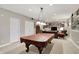 Finished basement featuring a pool table, recessed lighting, and movie-themed decor at 6110 Tanana Dr, Carmel, IN 46033