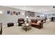 Spacious finished basement with a seating area, movie posters, and a pool table at 6110 Tanana Dr, Carmel, IN 46033