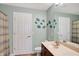Bathroom with sea turtle wall art, a light color scheme, and a single vanity at 6110 Tanana Dr, Carmel, IN 46033