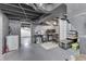 Finished basement with storage or office area, exposed ducts, painted floor, offering potential for versatile use at 631 E 86Th St, Indianapolis, IN 46240