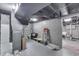 Basement space that offers unfinished storage potential, painted walls and open ceiling at 631 E 86Th St, Indianapolis, IN 46240