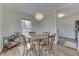 Charming dining room with a chandelier, hardwood floors, and natural light at 631 E 86Th St, Indianapolis, IN 46240