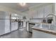 Bright and modern kitchen features stainless steel appliances and butcher block countertops at 631 E 86Th St, Indianapolis, IN 46240
