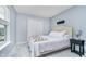 Cozy bedroom with neutral decor, a sliding door closet, and a gray bedside table at 726 Jefferson Park Dr, Pittsboro, IN 46167