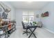 Comfortable office space featuring a neutral color scheme, a large window, and decor at 726 Jefferson Park Dr, Pittsboro, IN 46167