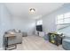 Relaxing living room with comfortable seating, a modern TV stand, and an engaging arcade game table at 726 Jefferson Park Dr, Pittsboro, IN 46167