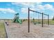 A fun community playground area with a slide, climbing stairs and swings for outdoor recreation and fun for all ages at 726 Jefferson Park Dr, Pittsboro, IN 46167