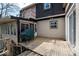 Backyard deck with furniture and a grey brick wall at 788 S Harbour Dr, Noblesville, IN 46062