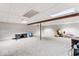 Spacious basement with carpeted floors and wooden support beams, awaiting customization at 788 S Harbour Dr, Noblesville, IN 46062