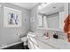 Bright bathroom featuring a window, white vanity with marble counters, and toilet at 788 S Harbour Dr, Noblesville, IN 46062