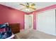 Cozy bedroom with wood fan and carpeted floors, offers ample closet storage at 788 S Harbour Dr, Noblesville, IN 46062