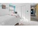 Inviting bedroom with carpeted floor, white walls, a comfortable bed, and plenty of sunlight from the window at 788 S Harbour Dr, Noblesville, IN 46062