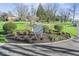 Beautifully landscaped entrance to the South Harbour Clubhouse with lush greenery and clear signage at 788 S Harbour Dr, Noblesville, IN 46062