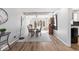 Open dining room showcasing modern light fixture, wood flooring and plenty of natural light at 788 S Harbour Dr, Noblesville, IN 46062