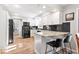 Modern kitchen featuring white cabinets, granite countertops, stainless appliances, and a breakfast bar at 788 S Harbour Dr, Noblesville, IN 46062