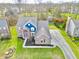Expansive aerial view showcasing the home's layout and meticulously landscaped yard at 8228 Morel Dr, Indianapolis, IN 46256