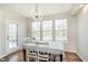 Charming breakfast nook with natural light and backyard views at 8228 Morel Dr, Indianapolis, IN 46256
