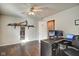 Home office with wood floors, natural light, and plenty of workspace at 8316 S Swimming Hole Ln, Pendleton, IN 46064