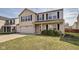 Charming two-story home features a two-car garage, well-maintained lawn, and classic architectural details at 8316 S Swimming Hole Ln, Pendleton, IN 46064
