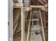 An unfinished attic space reveals wooden beams, ductwork, and insulation, offering potential for customization at 834 Bristle Lake Dr, Brownsburg, IN 46112