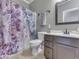 Bathroom featuring marble design shower curtain, sink and vanity at 834 Bristle Lake Dr, Brownsburg, IN 46112