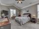 Vaulted ceiling bedroom features fireplace, ceiling fan, and neutral decor at 834 Bristle Lake Dr, Brownsburg, IN 46112