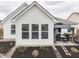 The house features a manicured lawn, tasteful landscaping, and a charming gazebo for outdoor relaxation at 834 Bristle Lake Dr, Brownsburg, IN 46112