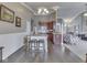 Bright kitchen area with island seating and seamless access to dining and living areas at 834 Bristle Lake Dr, Brownsburg, IN 46112