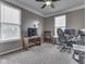 Home office with multiple work stations, a bookcase, and natural light at 834 Bristle Lake Dr, Brownsburg, IN 46112
