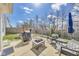 This backyard is great for families and features a patio, a grill, and a playground at 8610 Fawn Way, McCordsville, IN 46055