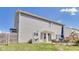 The backyard has a patio with outdoor furniture, a lawn, and a playground set at 8610 Fawn Way, McCordsville, IN 46055